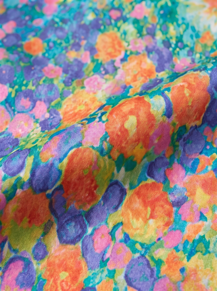 Carla | Robe midi légère et aérienne à motif floral pour invitée à un mariage